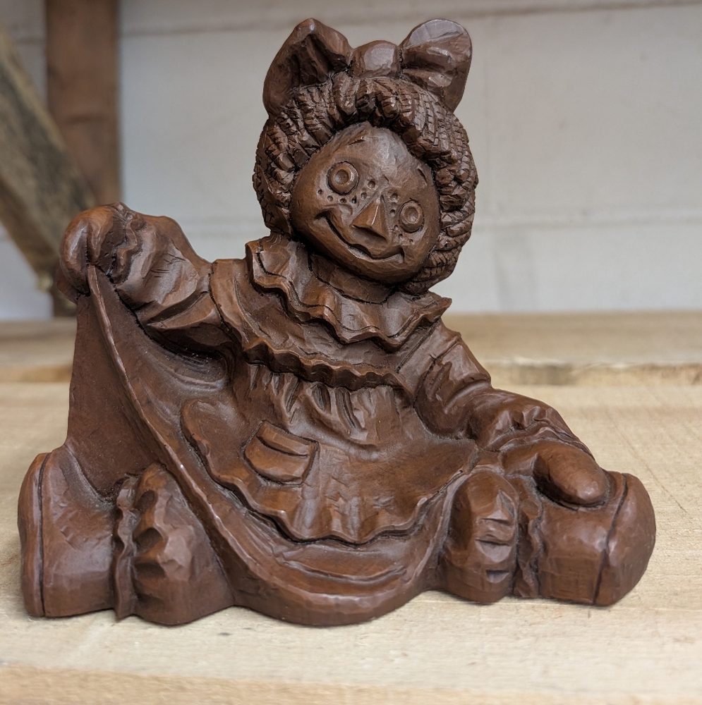 Whimsical Brown Rag Doll Sculpture